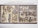 an old photo of a book with pictures of people and animals