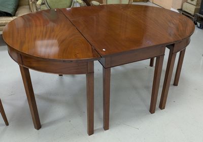 a table with two chairs and a table with a table top on it