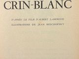 the front cover of a book with a black and white image of a cat