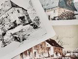three different pictures of a house and a boat on a table