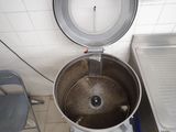 an image of a kitchen with a pot and a sink