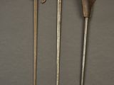three different types of tools are displayed on a gray surface