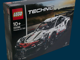a box of lego technics on a blue background
