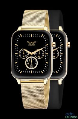 deux montres en or avec un cadran noir sur fond noir