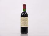 a bottle of wine that is sitting on a table