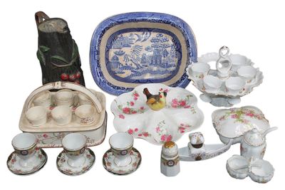 many different pieces of china on display on the table