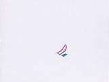 a small kite that is flying in the sky