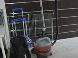 an image of a room with a vacuum and other items