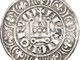 a close up of a silver coin with a crown on it