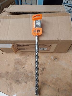 a box that has a drill on it and a box with a tool