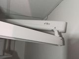 a picture of a picture of a white shelf in a room