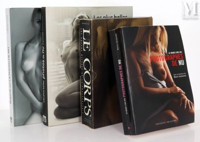 three books are stacked on top of each other on a white surface