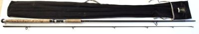 two fishing rods and a fishing rod on a table