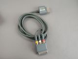 a cable that is connected to a mouse on a table
