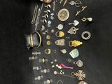 many different types of jewelry on the table