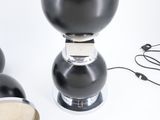 a lamp that is sitting on a table next to other items