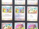 a lot of pokemon cards on display in a display case
