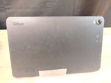a laptop that is sitting on a wooden table
