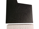 a picture of a piece of black and white paper on a white surface