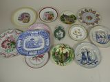 a lot of plates that are sitting on a table