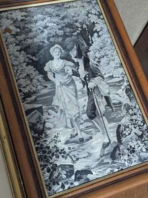 a picture of a painting of a man and a woman in the woods