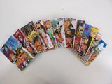 a bunch of dragon ball cards sitting on top of a table