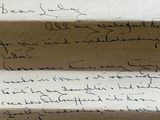 a close up of a piece of paper with writing on it