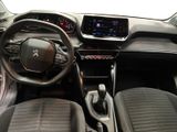 the interior of a car with a steering wheel and dashboard controls