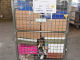 a metal cart with a sign on it in a warehouse