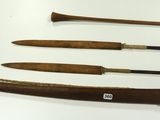 several different types of weapons are displayed on a white surface