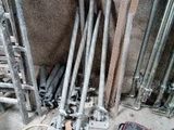 a pile of construction materials and tools on the floor