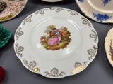 a lot of plates that are sitting on a table