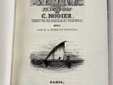 an old book with a picture of a boat in the water