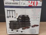 a box with a bunch of pots and pans in it
