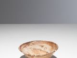 an image of a wooden bowl sitting on top of a table