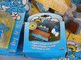 a box with a toy train in it on a table