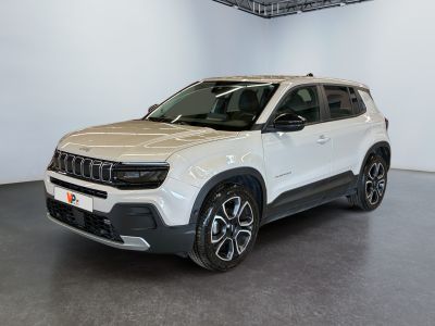 a white suv is parked in a large room