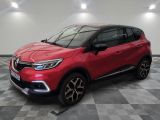 a red renault c - cross suv parked in a showroom