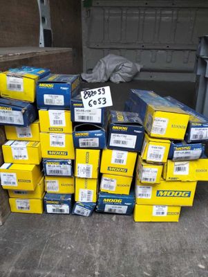 a pile of boxes that are stacked up on the ground
