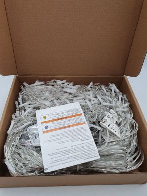 a box of shredded shredded paper sitting on top of a table