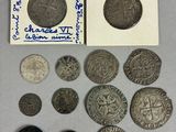 a close up of a piece of paper with a bunch of coins