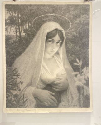 an old picture of a woman holding a baby in her arms