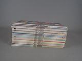 a stack of books that are stacked on top of each other