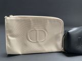 a close up of a black and white toilet bag and a black and white toilet bag