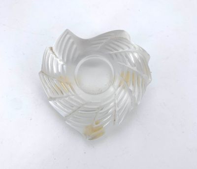 a white object that is sitting on a white surface