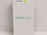 a close up of a white box with a green sticker on it
