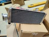 a radiator that is sitting on top of a cardboard box