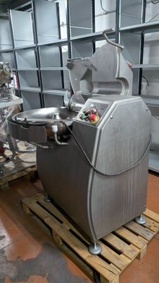 a machine that is sitting on a pallet in a warehouse