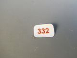 a white sticker with the number 32 on it
