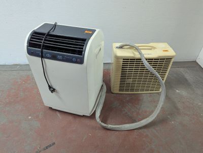 a small air conditioner sitting next to a small air conditioner